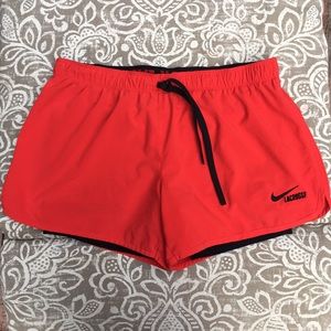 Red Nike lacrosse training shorts